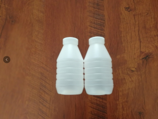 Mleko 1000 ml Plastikowa maszyna do rozdmuchiwania butelek 4 formy obrotowe w pełni automatyczne
